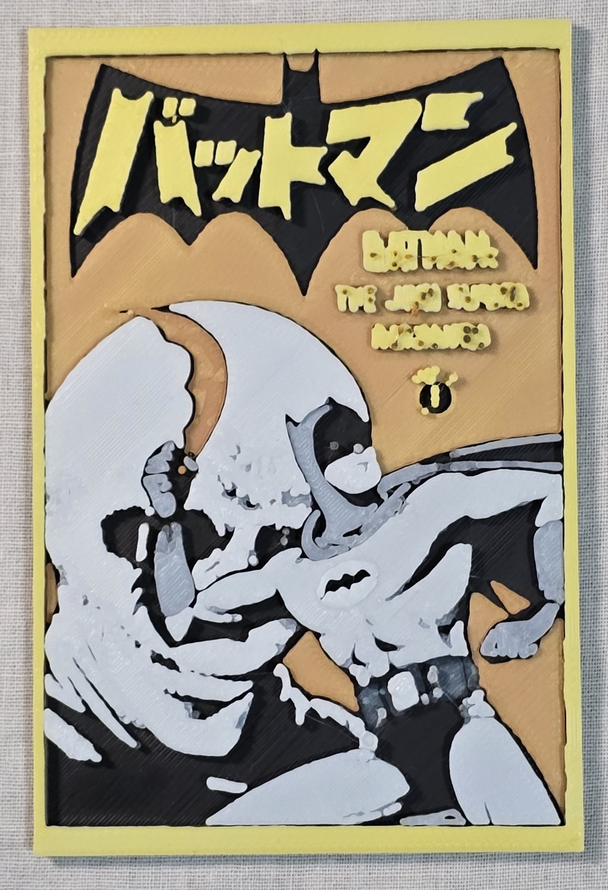 Finished Batmanga print with Batman artwork and small text near the top